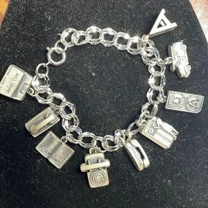 Vintage (rare) sterling telephone attendance charm bracelet